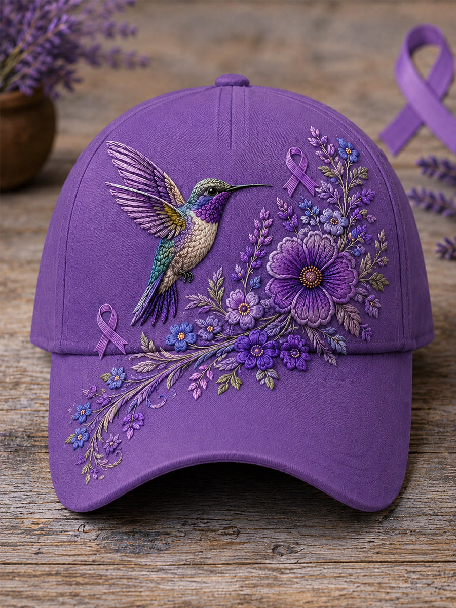 Unisex-Mütze in Lila mit Blumen- und Kolibri‑Muster zur Sensibilisierung für die Alzheimer‑Krankheit