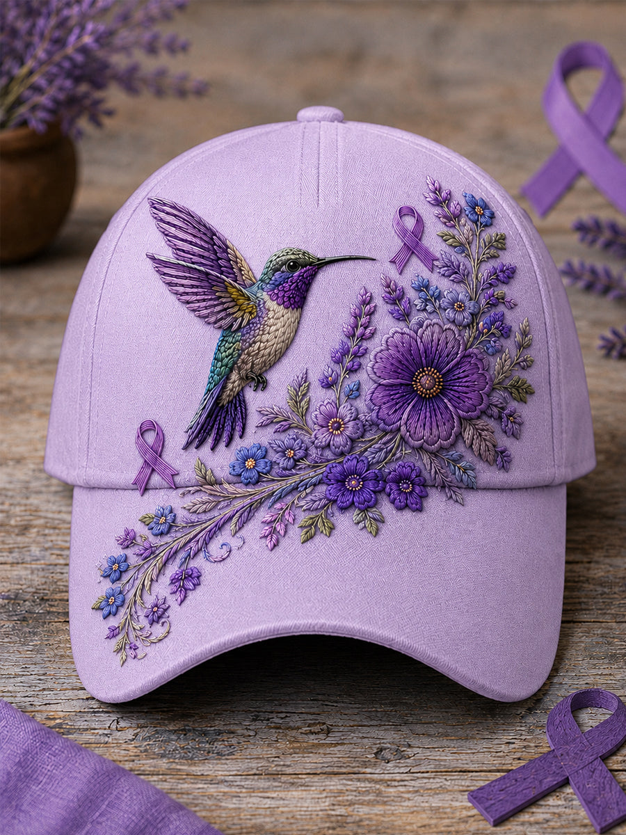 Unisex-Mütze in Lila mit Blumen- und Kolibri‑Muster zur Sensibilisierung für die Alzheimer‑Krankheit