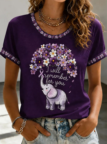 Damen-T-Shirt mit lila Blumenmuster und Aufdruck zur Sensibilisierung für Alzheimer